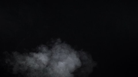 Shooting of white cigarette steam on black background