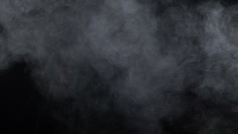 Smoke of cigarette on black background