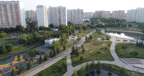 4K Wide angle view on Gavrikovskiy pond and Butovo park, Moscow, Russia. Drone flight video