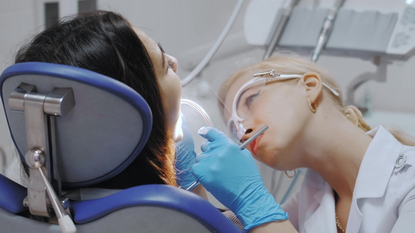 A Female Dentist Drilling A Stockvideoklipp Helt Royaltyfria 1031509253 Shutterstock A Female Dentist Drilling A Stockvideoklipp Helt Royaltyfria 1031509253 Shutterstock