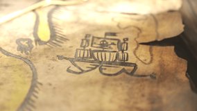 Funny hand-drawn ancient map with animated drawings. Camera is  moving over the map showing sailing pirate ship, flag, palm trees, cannibal dancing near the pot and treasure chest full of gold
 - Powered by Shutterstock - Get 15% off with code: PIKWIZARD15