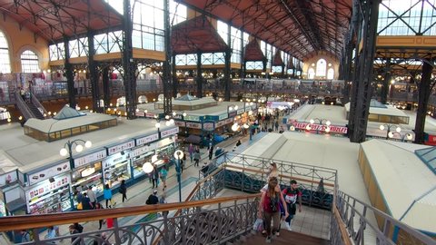 Budapest, Hungary - May 27, 2019 : People shopping in the Great Market Hall in Budapest, Hungary. Great Market Hall is the largest indoor market in Budapest, it was built in 1896