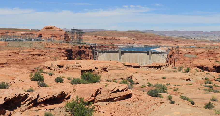 Lake Powell Glen Canyon Dam electricity Arizona. Concrete arch gravity dam on the Colorado River in northern Arizona. Forms Lake Powell. Major source of hydro electric power.