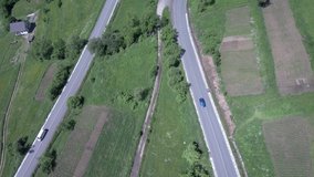 Video drone aerial view over the road in the forest1.