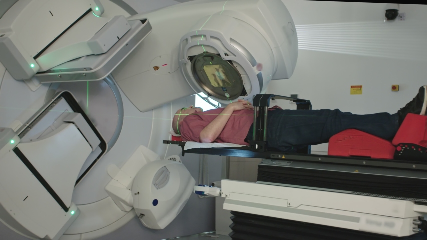 Patient Getting Radiation Therapy Treatment Inside A Modern Radiotherapy Room Royalty-Free Stock Footage #1031553095