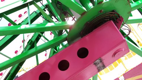 Rotating components of carnival ride slow motion