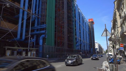 Paris, France - June 2019 : Centre Pompidou Beaubourg in the center of Paris France, facade of the modern art and contempary museum with its famous colored pipes on a spring day