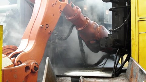 Buenos Aires / Argentina - March 2020: Robotic Arm at Work. Close-Up.  Original Audio.