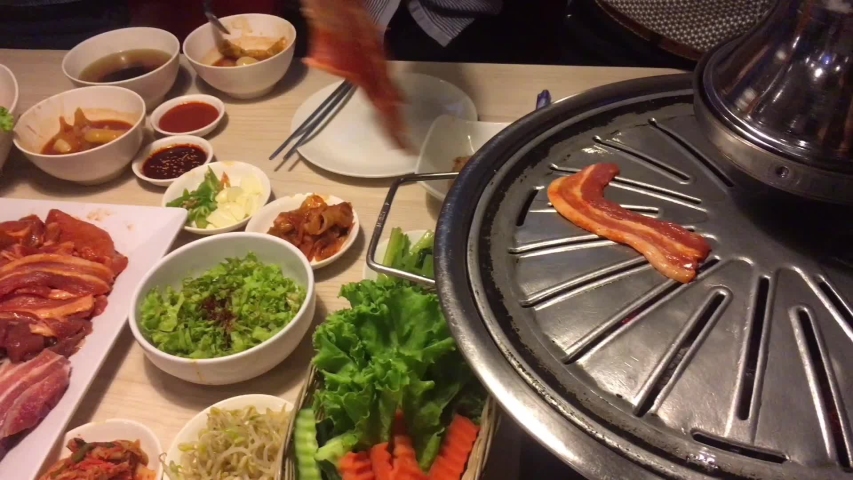 People are eating at Korean Restaurant to celebrate new Salary and Bonus after midyear working 