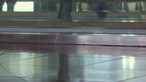 People on moving walkway at airport 4k