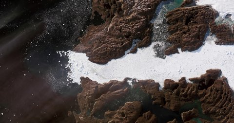 Very high-altitude overflight aerial of Disko Bay, Jakobshavn Glacier, Greenland. Clip loops and is reversible. Elements of this image furnished by NASA