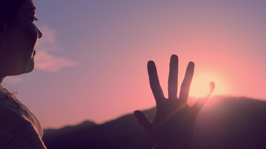 Female hands playing with sun beams. | Shutterstock HD Video #1031620976