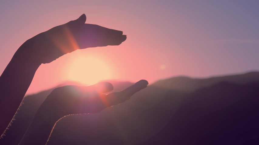 Female hands playing with sun light | Shutterstock HD Video #1031620979
