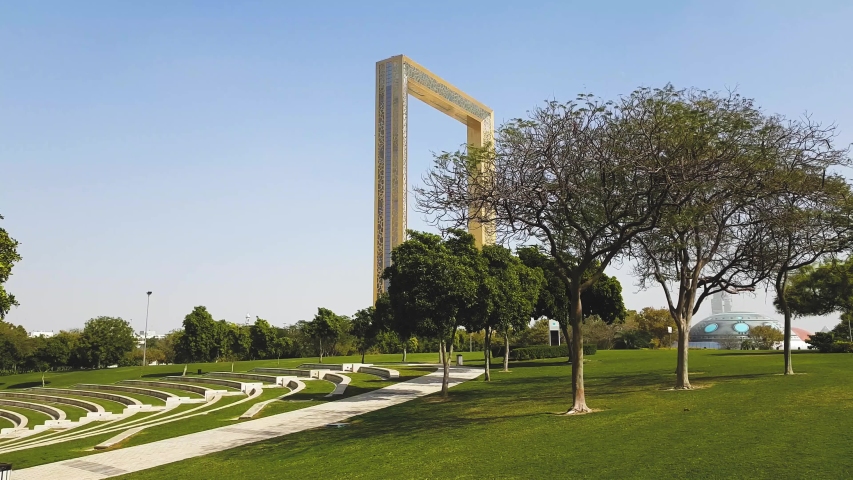 Sunny day, clear blue sky, Dubai Golden Frame in Zabeel Park. Dubai, UAE Royalty-Free Stock Footage #1031622599