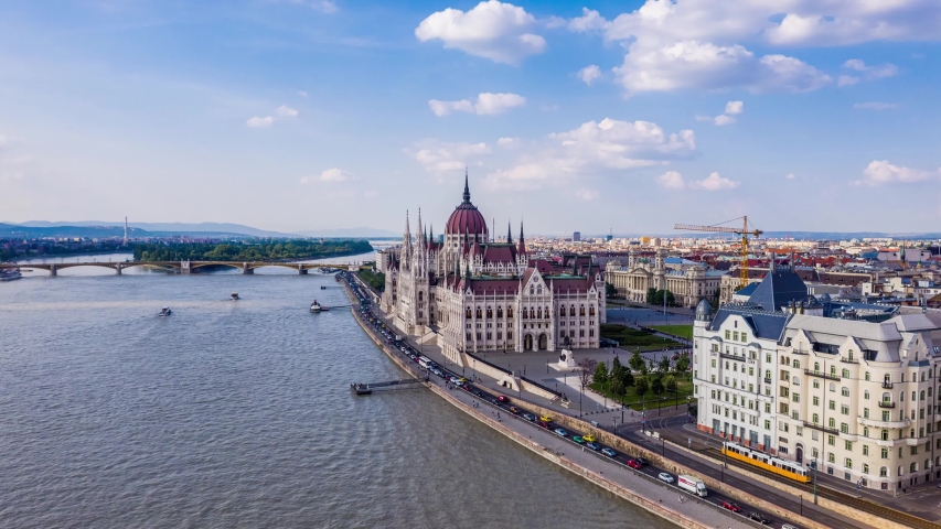 Budapest, Hungary - Aerial time-lapse (hyperlapse) footage about the beautiful Parliament building of Hungary by River Danube on a bright summer day