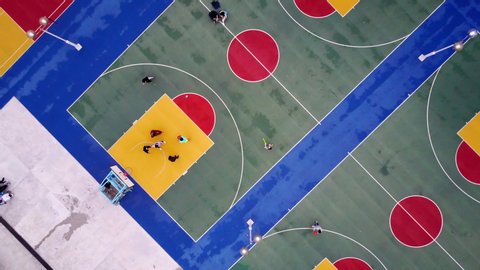 Aerial Flyover of Incredibly Colorful Basketball Courts in Hong Kong - Hong Kong, China