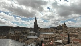 The timelapse video of Toledo, Spain. Fixed angle time lapse video.Puffy fluffy white clouds blue sky time lapse move cloud