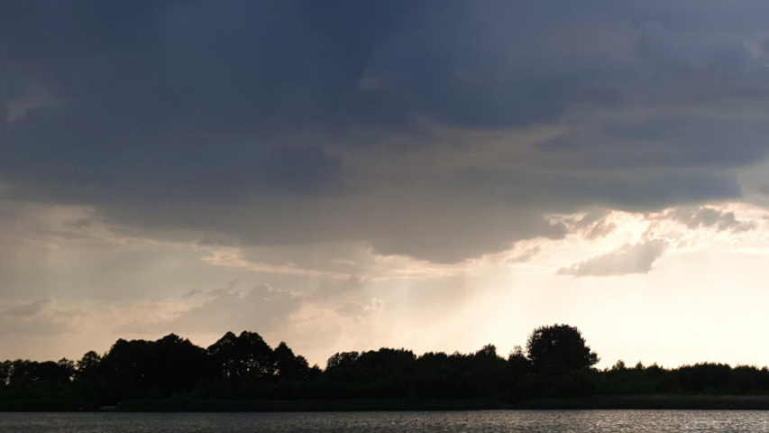 Rain clousd over summer lake