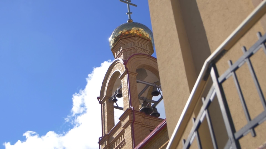 Dove flies from the bell Church
