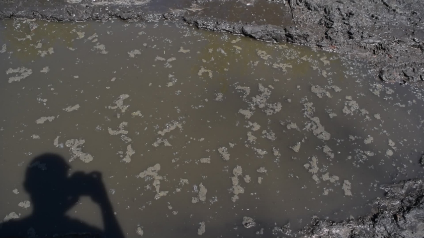 Background of dirty water on black ground
