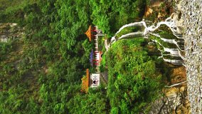 Changchun Temple or Eternal Spring Shrine with Waterfall at Taroko Gorge National Park in Taiwan. Vertical Video