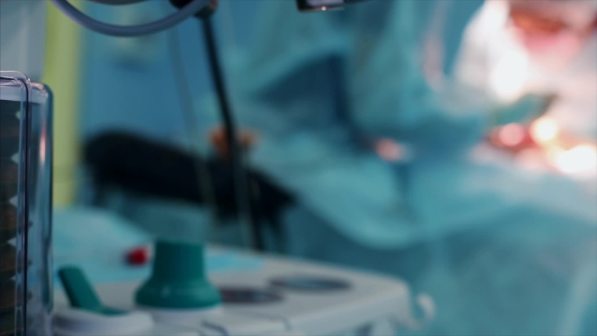 Close up view of anaesthesia machine ventilator and patients monitor inside the operating room.