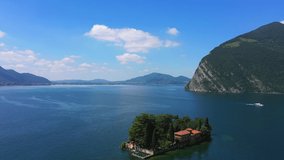 Aerial video with drone. The beautiful island of Monte Isola on Lake Isola, Italy.
