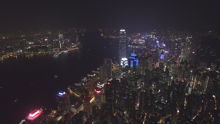 Hong Kong Victoria Harbor aerial shot at night | Shutterstock HD Video #1031819378