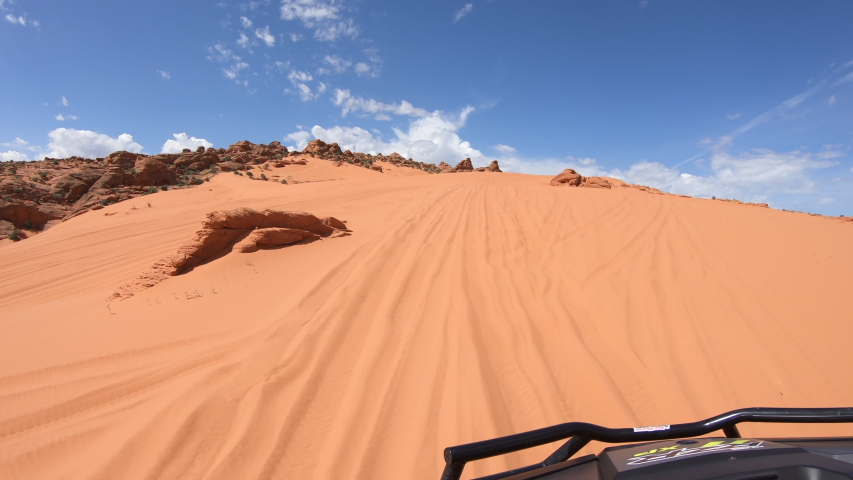 Sand Hollow Utah off road recreation sand mountain. Southern Utah desert Sand Hollow. Red sandstone, dirt sand trails. Outdoor extreme 4x4 recreation ride and adventure. Point of view, POV.
