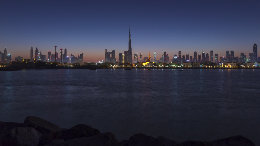 4K Time lapse - Urban Skyline and modern skyscrapers in Dubai UAE at sunrise. Royalty-Free Stock Footage #1031843807
