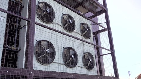 Air conditioner unit fan rotating. Industrial air conditioning system