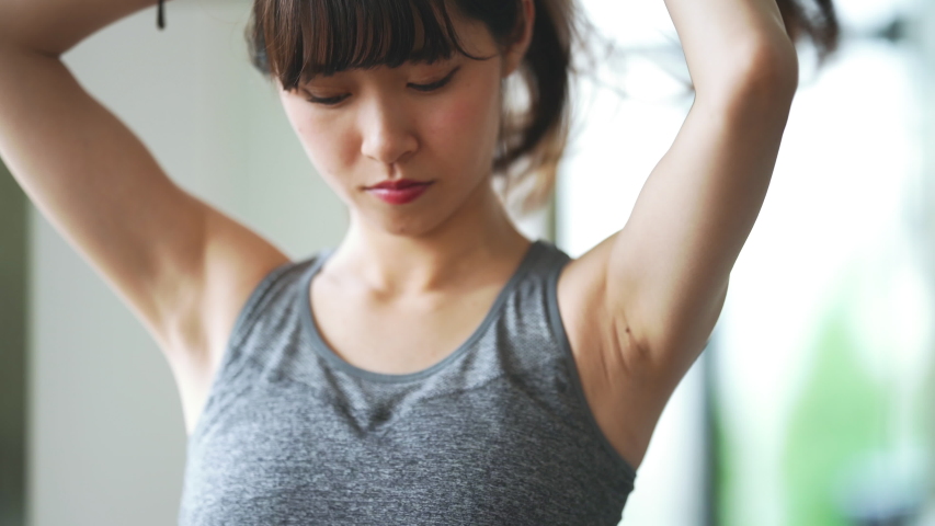 Young Asian Woman Ties Up Stock Footage Video 100 Royalty Free 1031858861 Shutterstock