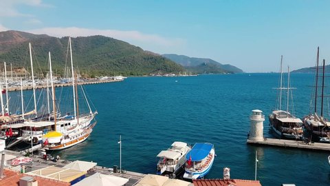 Marmaris, Turkey - April 20, 2019: Panorama from above on the marina with yachts. Aerial veiw bay