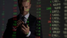 executive smart caucasian businessman use smartphone for trade and invest in stock market double exposure with financial stock chart business ideas concept - Powered by Shutterstock - Get 15% off with code: PIKWIZARD15