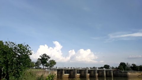 Time lapse over time of the sky, clouds over the Rasi Salai Dam,sisaket,thailand. Weather forecasting and agriculture