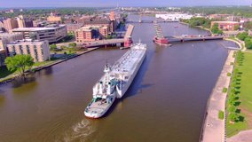 Bridges opening for massive Freighter ship on the Fox River through downtown Green Bay.

