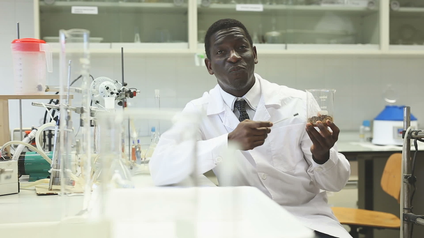 Portrait of proffesional man lab scientists in interior of laboratory