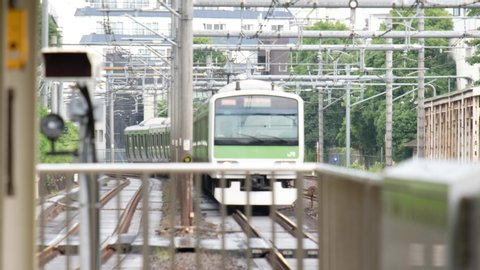 TOKYO, JAPAN - JUNE 23RD, 2019. Japan Railway Yamanote train line at Harajuku Station. Selective focus.