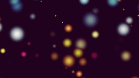 3D art video animation rendering of round colored particles with the effect of a blyuring slowly moving in dark space