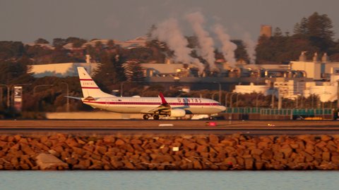 Sydney, Australia - May 31, 2019:  Qantas Boeing 737-838 VH-VXQ “Retro Roo II” in the historic qantas colours celebrating the 95th anniversary of Qantas takes off from Sydney airport.
