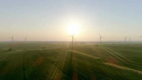Drone view of wind turbines in sunny day