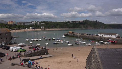 Tenby, Pembrokeshire / Wales - June 01 2019: Tenby is renowned for being a picturesque seaside town is South Wales having over 2 million visitors a year UK 4K.