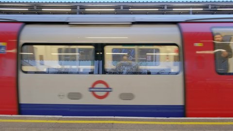 London, United Kingdom (UK) - 11 13 2018: London Underground Train Passing Station Slow Motion