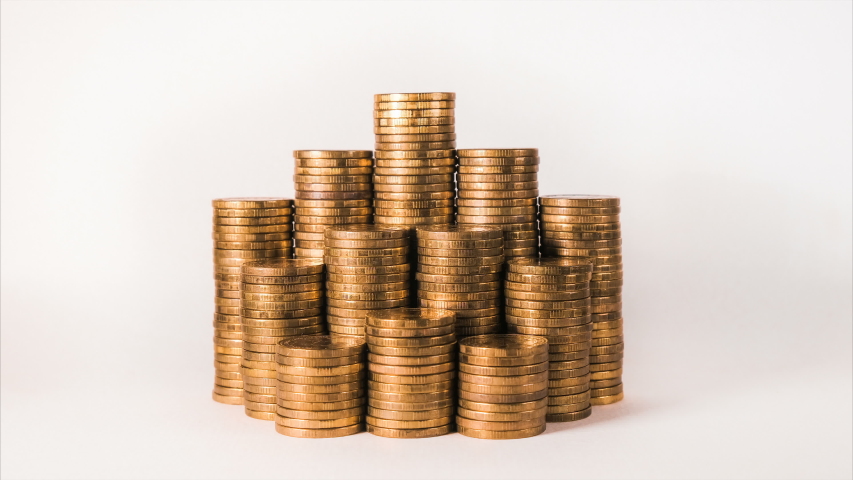 isolated motion graph with gold coins on white background