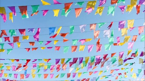 Typical colorful flags blowing in the wind - they are used for decoration at the June Festivals (aka festas de Sao Joao), popular festivities in Brazil (Oeiras, Piaui)