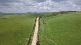 Aerial footage of the cypresses road in Tuscany, Italy - Powered by Shutterstock - Get 15% off with code: PIKWIZARD15