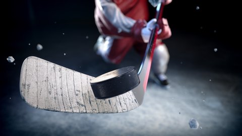 Hockey player in red uniform hits the puck in slow motion. Amazing close-up (4k, 3840x2160, ultra high definition)