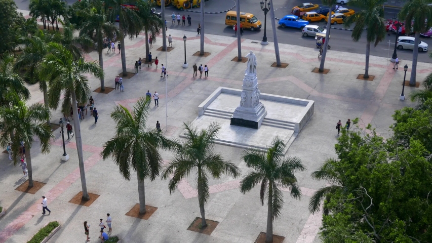 AERIAL: People walking on Parque Central with the statue of José Martí, a Cuban National Hero and important figure in Latin American literature.