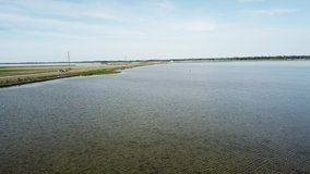 Estonia - Saaremaa Baltic sea coastline, Nice weather and great day for fishing from boat. Little cloudy sky slow wind and quite sea.  Video from Drone 