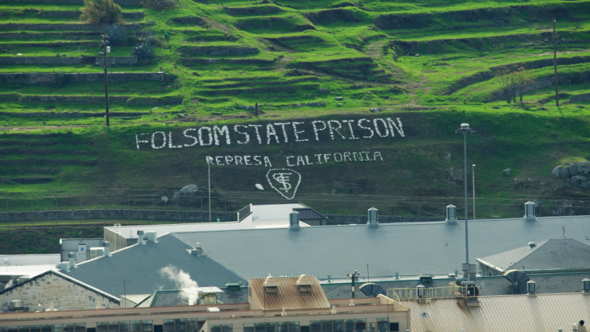 Aerial view of Folsom State Prison punishment detention center inmates jailed and incarcerated in cell blocks Northern California USA RED WEAPON